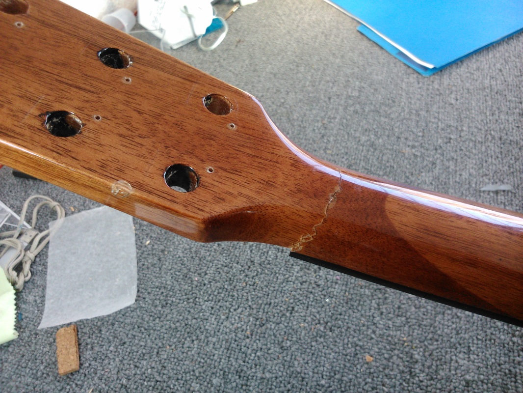 Fractura pegada - Reparación de Fractura en Mástil Fender