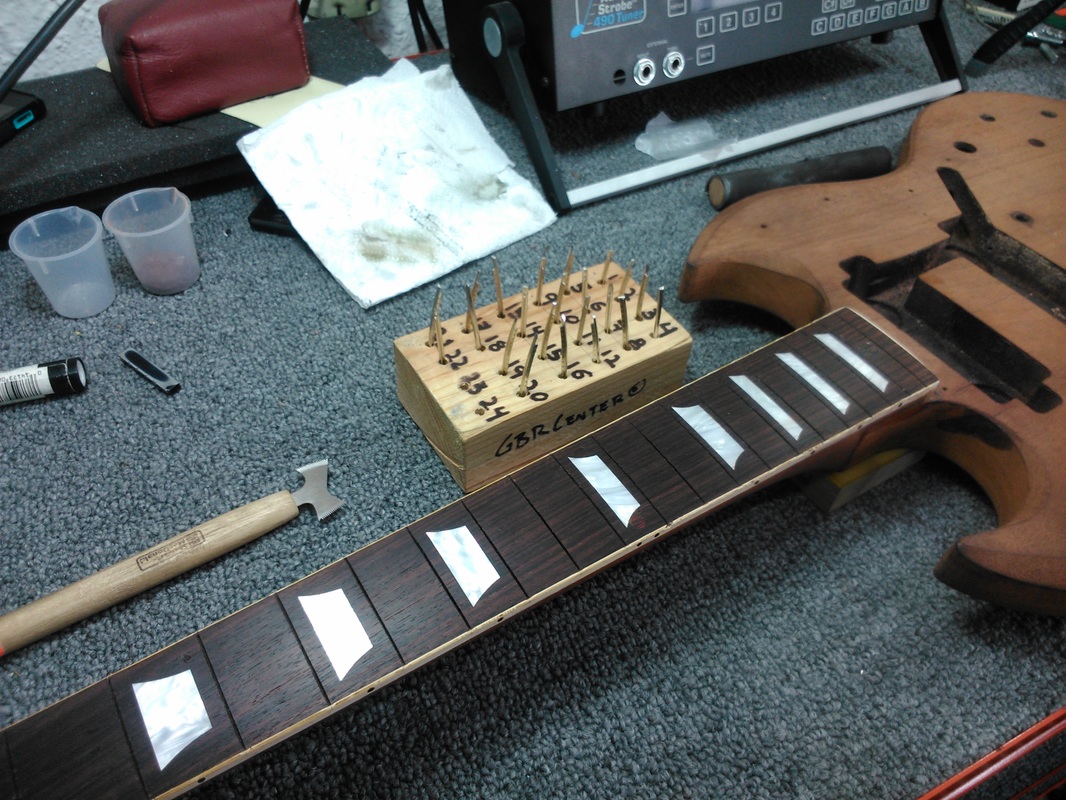 Entrastado - Restauración de guitarra Gibson SG